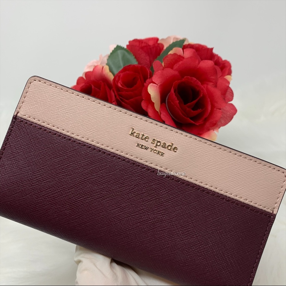 Kate spade NY large slim bifold wallet cherrywood